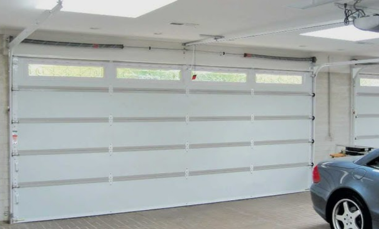 Professional technician performing a same-day garage door repair at Alum Creek Garage Doors Repair, delivering fast and reliable service to customers.