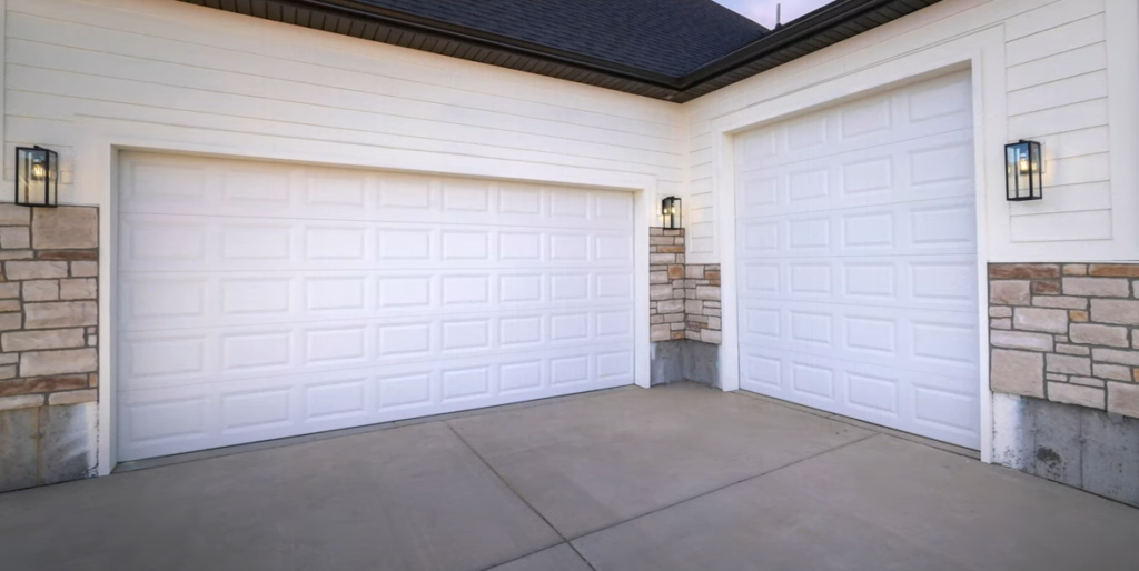 Before and after view of a residential garage door replacement by Alum Creek Garage Doors Repair, featuring an old, worn-out door replaced with a new, modern garage door.