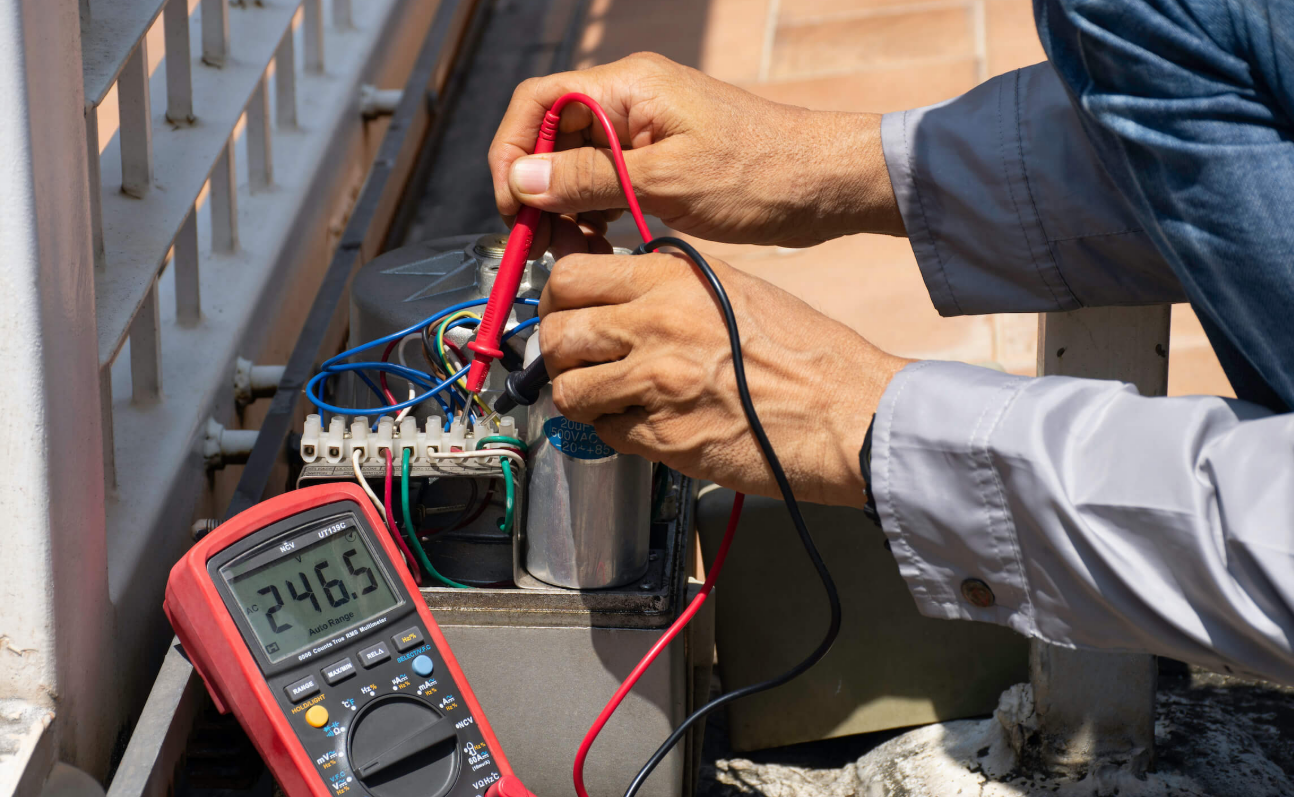 Technician performing automated gate system for a residential property, showcasing tools and expertise with a focus on reliability and precision