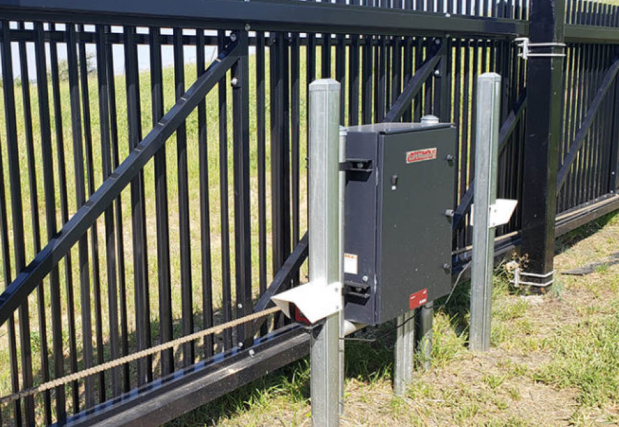 Modern automated gate system installed by Alum Creek Garage Doors Repair, featuring sleek metal design and advanced control panel for enhanced security and convenience.